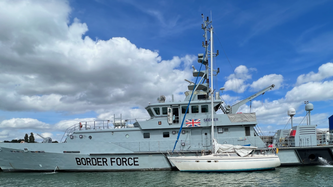 Border Force boat alongside small yacht