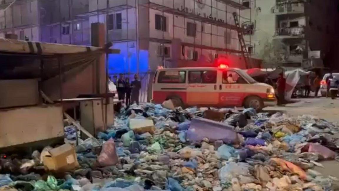 Screengrab of a World Health Organization video showing a Palestinian Red Crescent ambulance outside Kamal Adwan hospital in northern Gaza (24 October 2024)