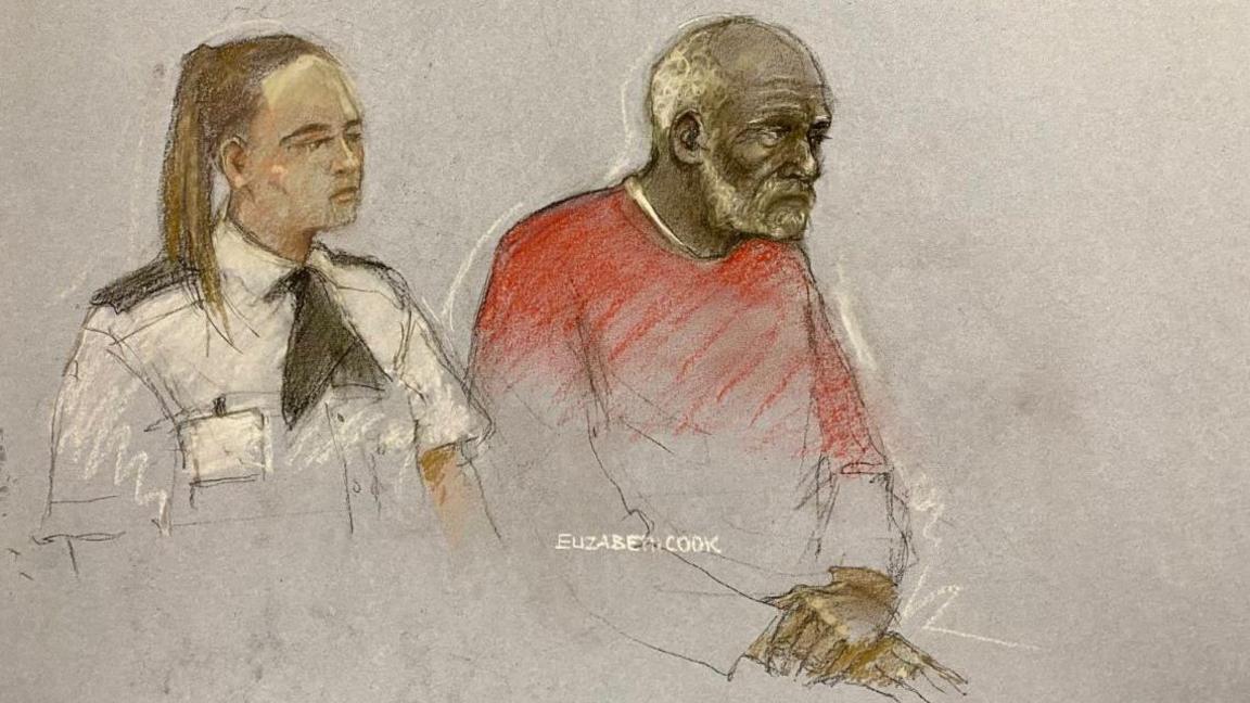 Ryland Headley wearing a red jumper in a court sketch. He is sitting in the dock next to a female security officer. He has his palms crossed on his lap in front of him.