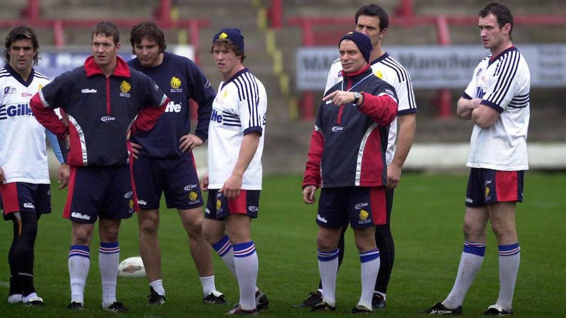 Brian Noble stands with his Great Britain players during a training session for the 2004 Tri-nations series