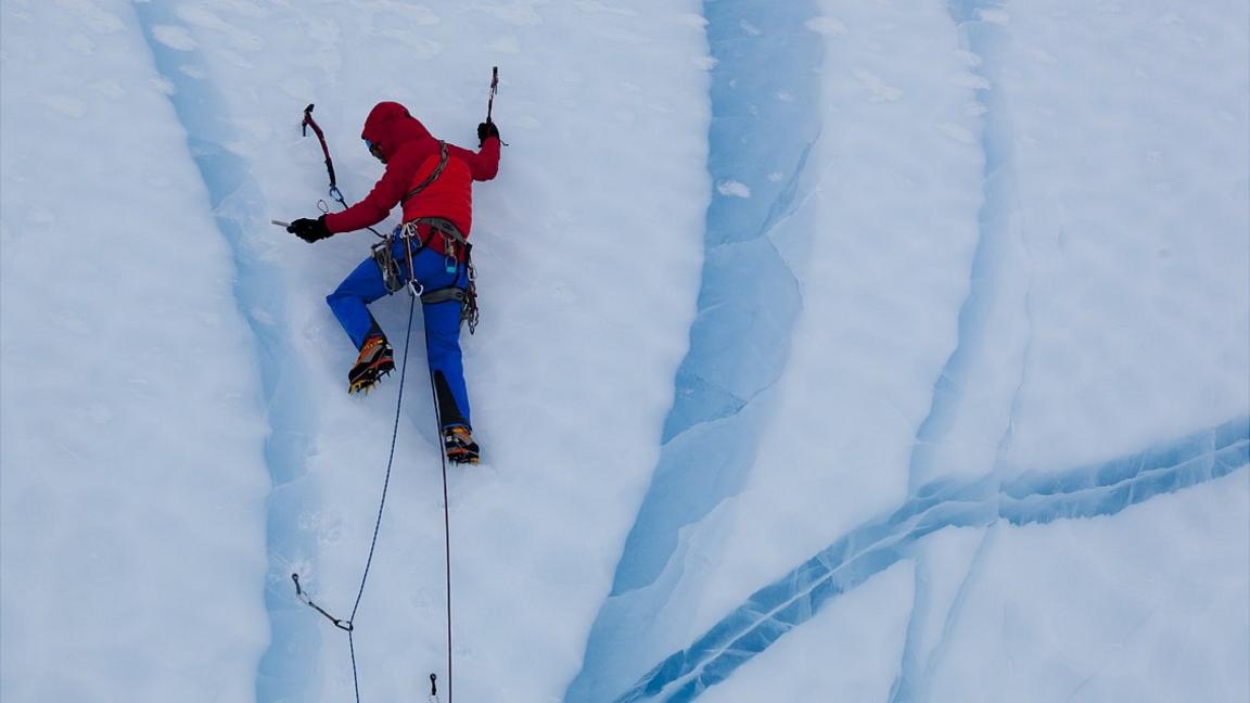 Climber on ice wall