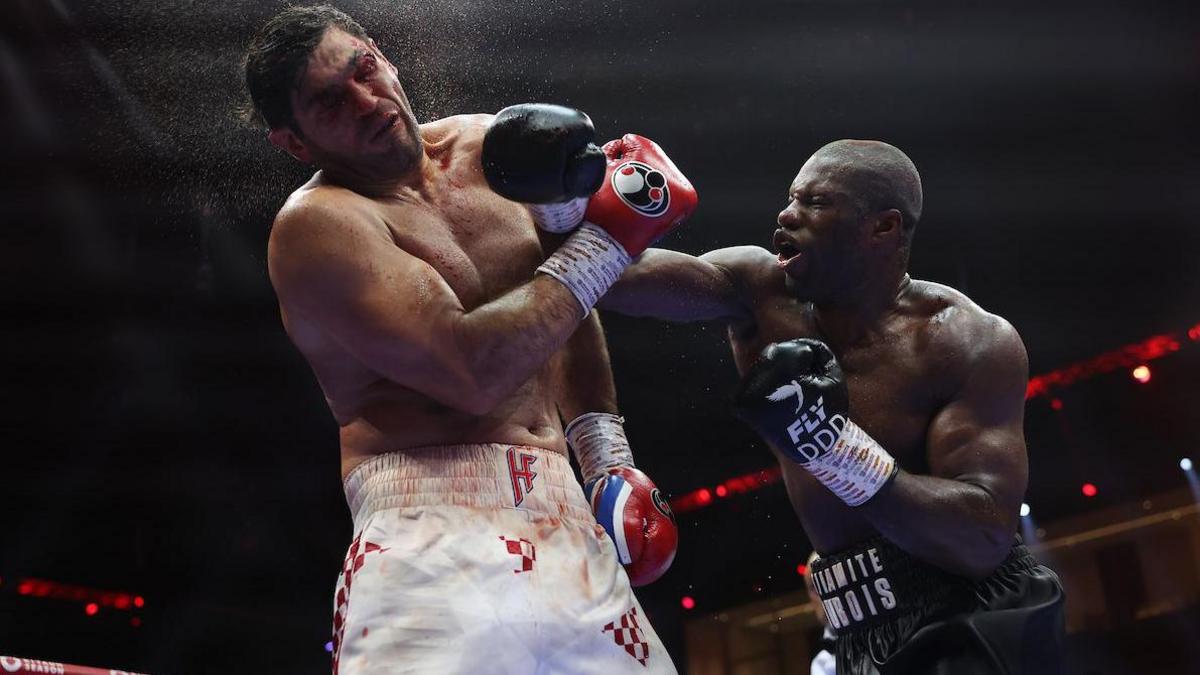 Daniel Dubois throws punch at Filip Hrgovic