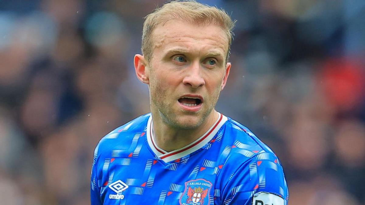 Dylan McGeouch playing for Carlisle on the last day of last season