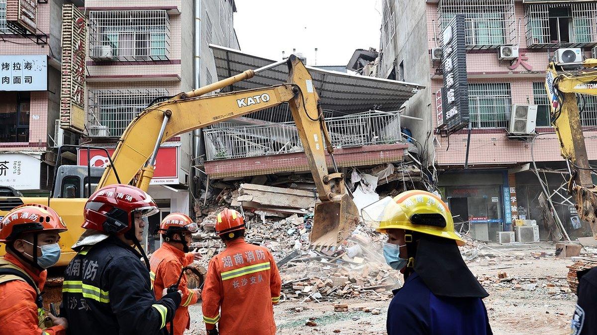 Rescuers work at the collapse site of a self-constructed residential building on April 29, 2022 in Changsha, Hunan Province of China. The incident took place on Friday in Wangcheng District in Changsha