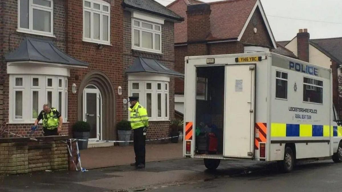 Police cordon outside a house in Holmfield Avenue in Leicester