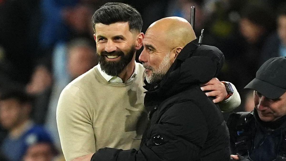 Miron Muslic and Pep Guardiola embrace after Saturday's game