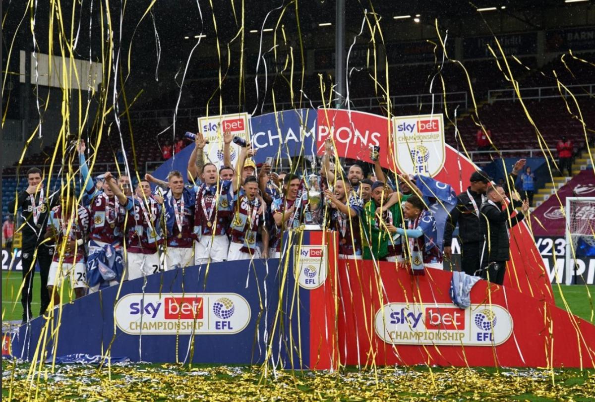 Burnley's Josh Brownhill and Jack Cork lift the Sky Bet Championship trophy after the Sky Bet Championship match at Turf Moor, Burnley.