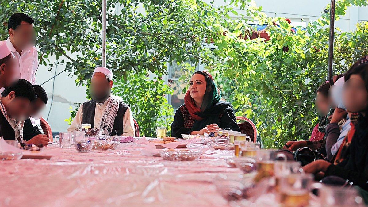 Shukria Barakzai talking to her campaign team in Kabul, 2010