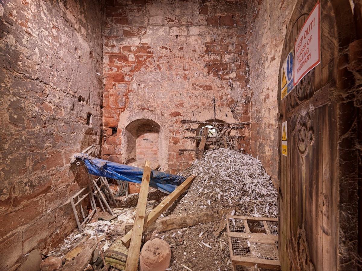 View of interior to base of derelict 13th Century tower prior to repair