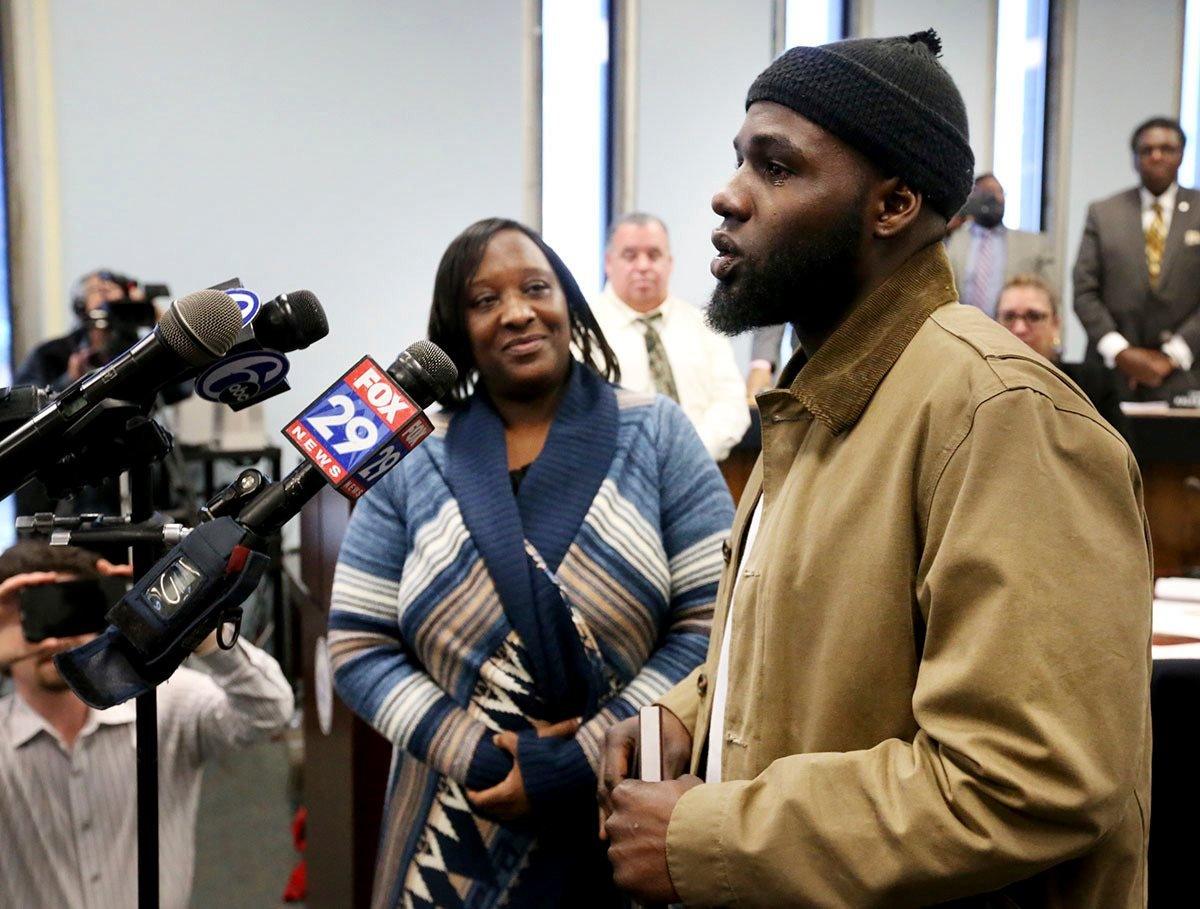 Ibn Ali Miller speaks as his mother Sabrina Winters looks on at an Atlantic City Council meeting where he was honoured Wednesday March 22, 2017, in Atlantic City.