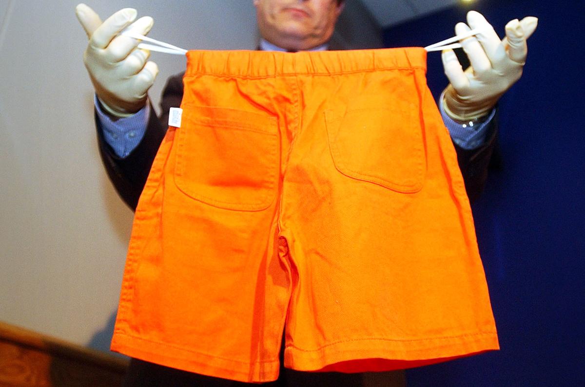 Police displayed a pair of shorts similar to those found on Adam's torso in the River Thames, January 2002