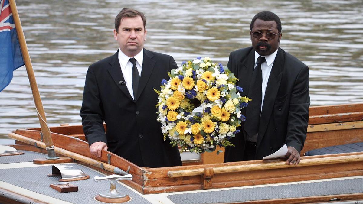 A wreath was placed in the Thames in memory of "Adam", September 2002 - pictured DI Will O'Reilly and John Azah (independent advisory group)