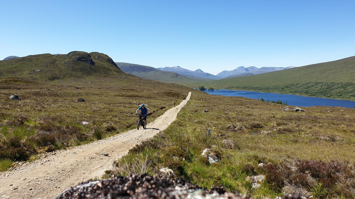 man on bike in scotland