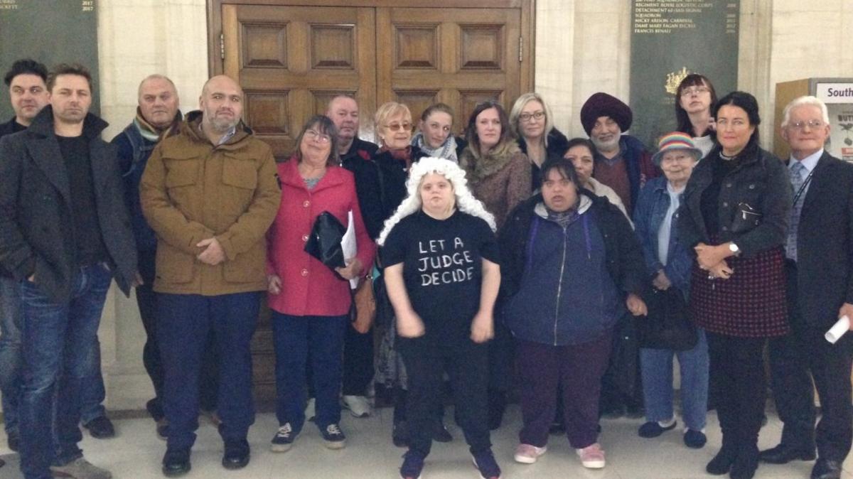 Campaigners outside the council chamber