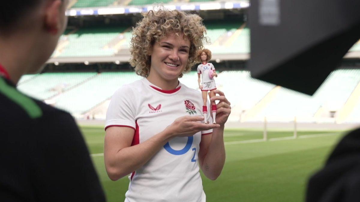 Ellie Kildunne holding Barbie doll. 