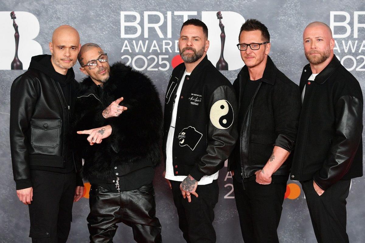 Five at the Brit Awards 2025, they are all wearing black outfits.