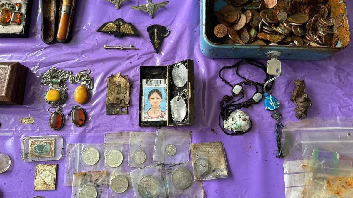 Medals and jewellery found during a litter pick in Plymouth