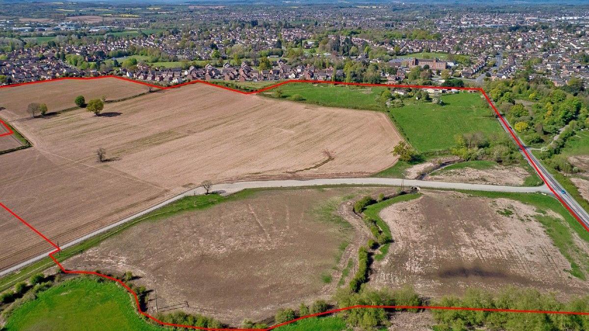 An outline of the proposed development site near Lugg Meadows in an image provided by campaigners. There is a red outline around a large open area near Hereford.
