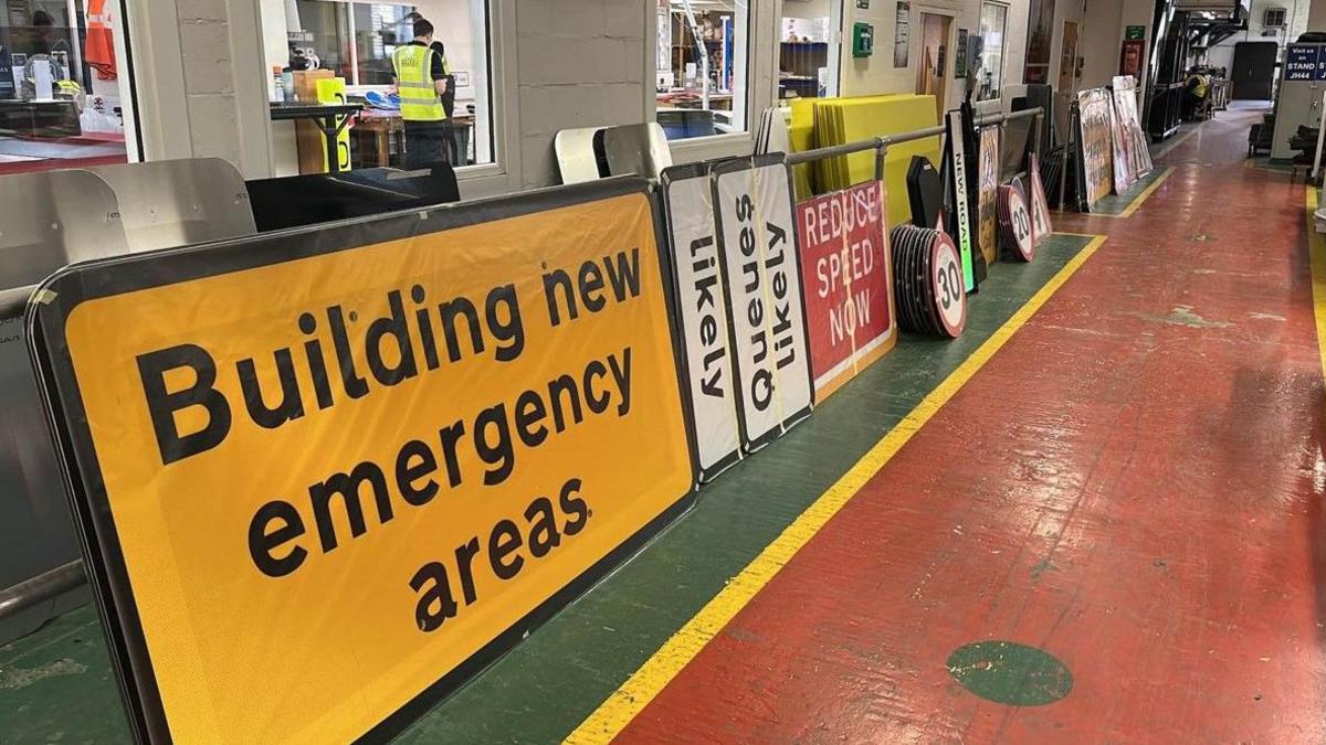 Signs on the factory floor