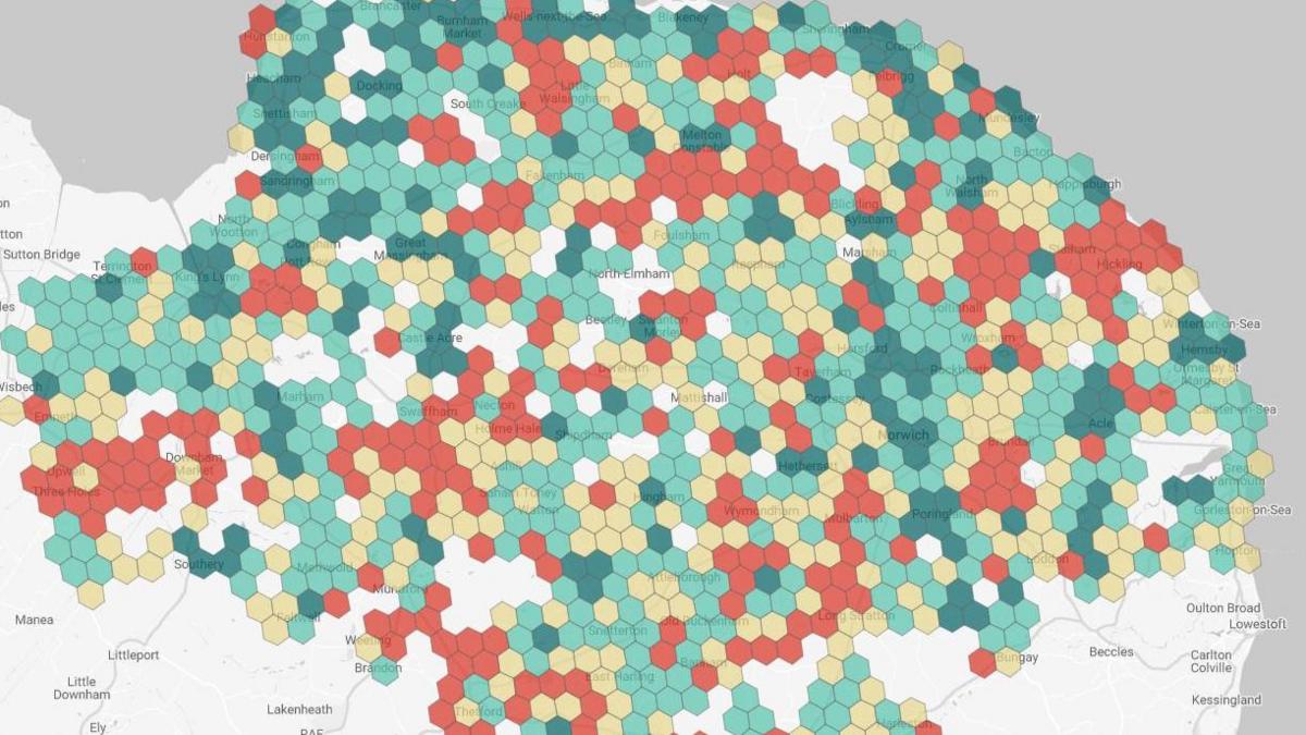 Map shows the strength of mobile signal through coloured hexagons. There is a mix of red, yellow, green and white shapes. 