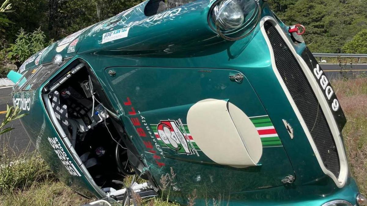 A green 1967 Aston Martin DB6 overturned and damaged after a rally in Mexico in 2022