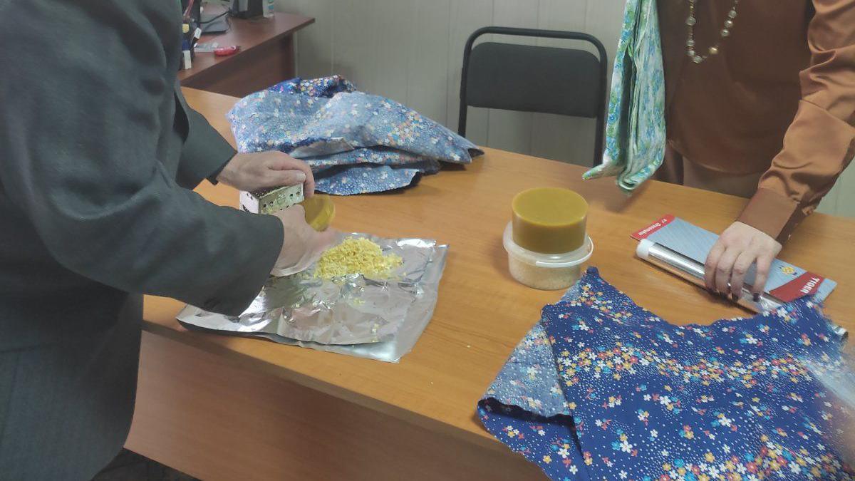 Beeswax shavings are rubbed into cloth to create food wraps