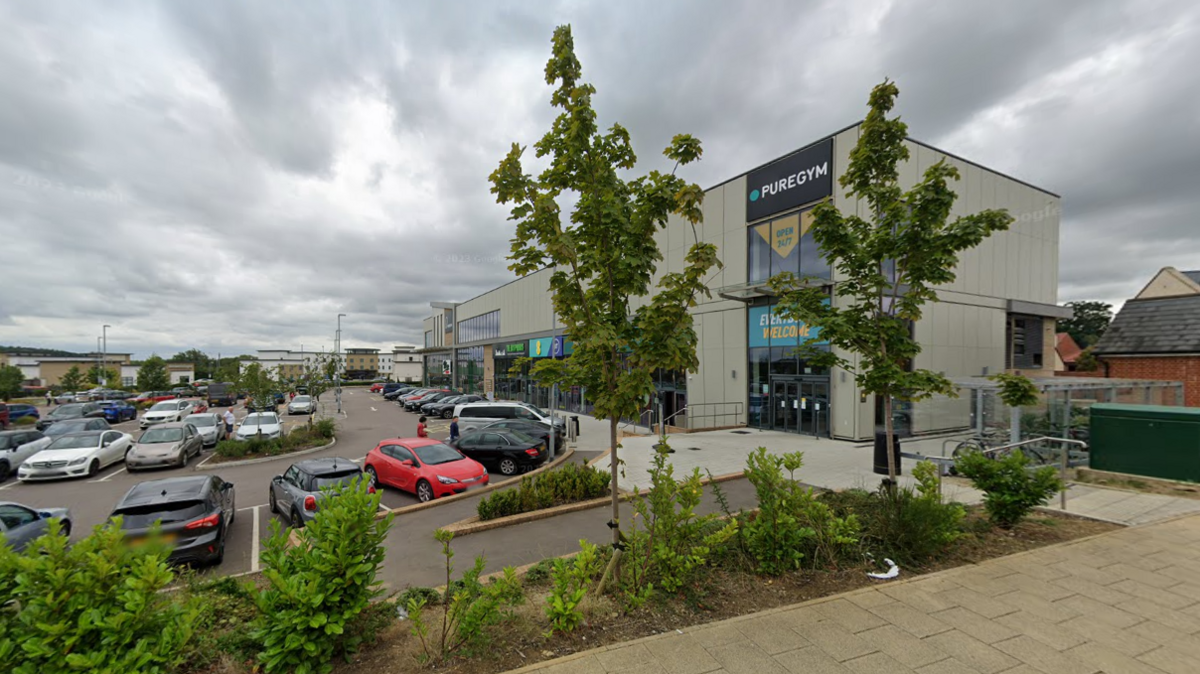 A general view of PureGym in the Bicester Shopping Park, which includes a car park.