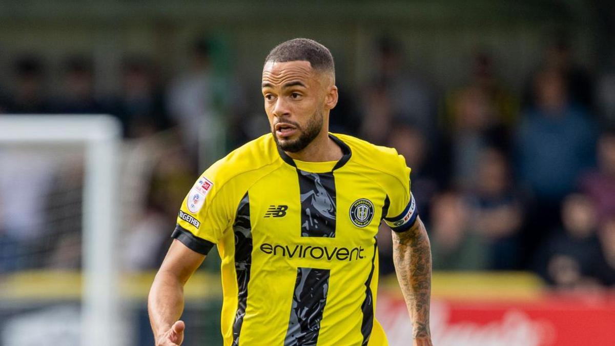 Warren Burrell in action for Harrogate Town