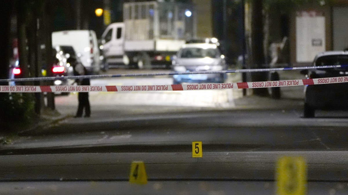 Police tape cordon off part of Rushmore Road in Clapton, Hackney, east London as the Met Police begin a murder investigation.