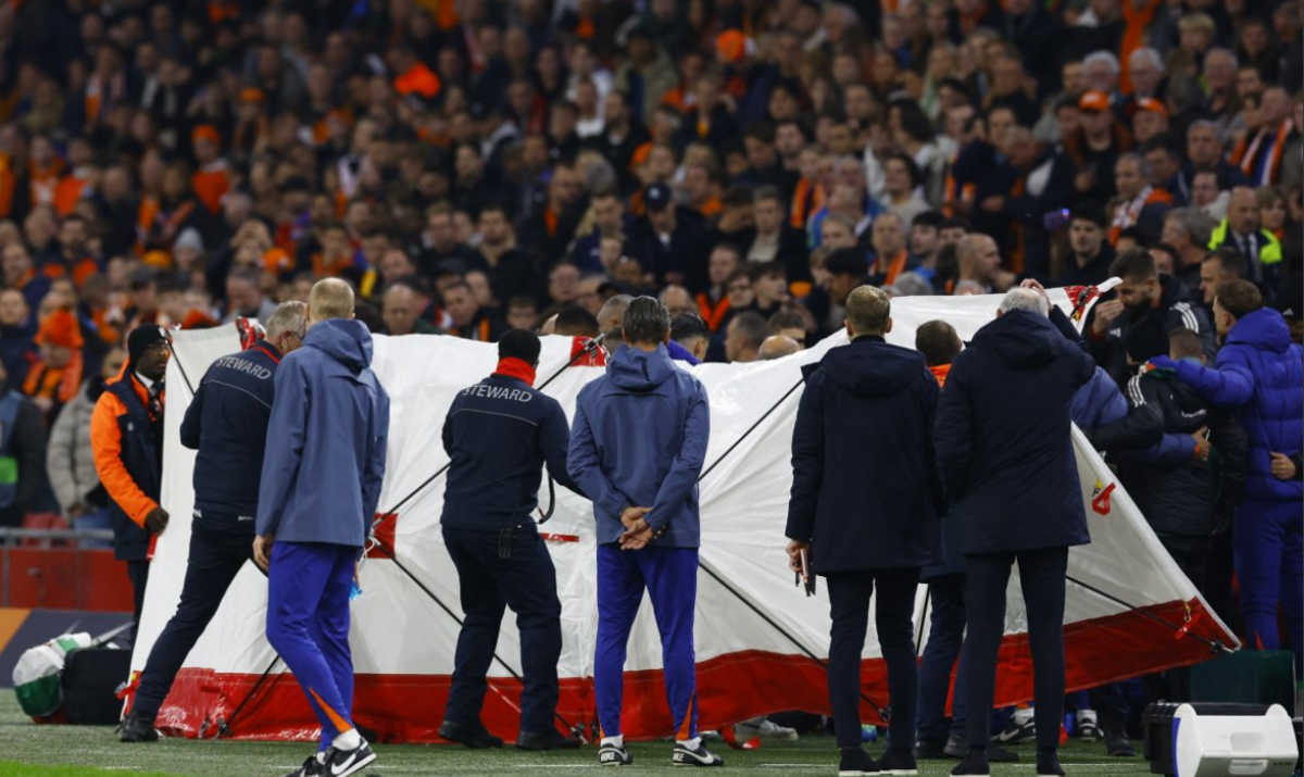 A white sheet was placed around Adam Szalai on the Hungary bench following the medical incident