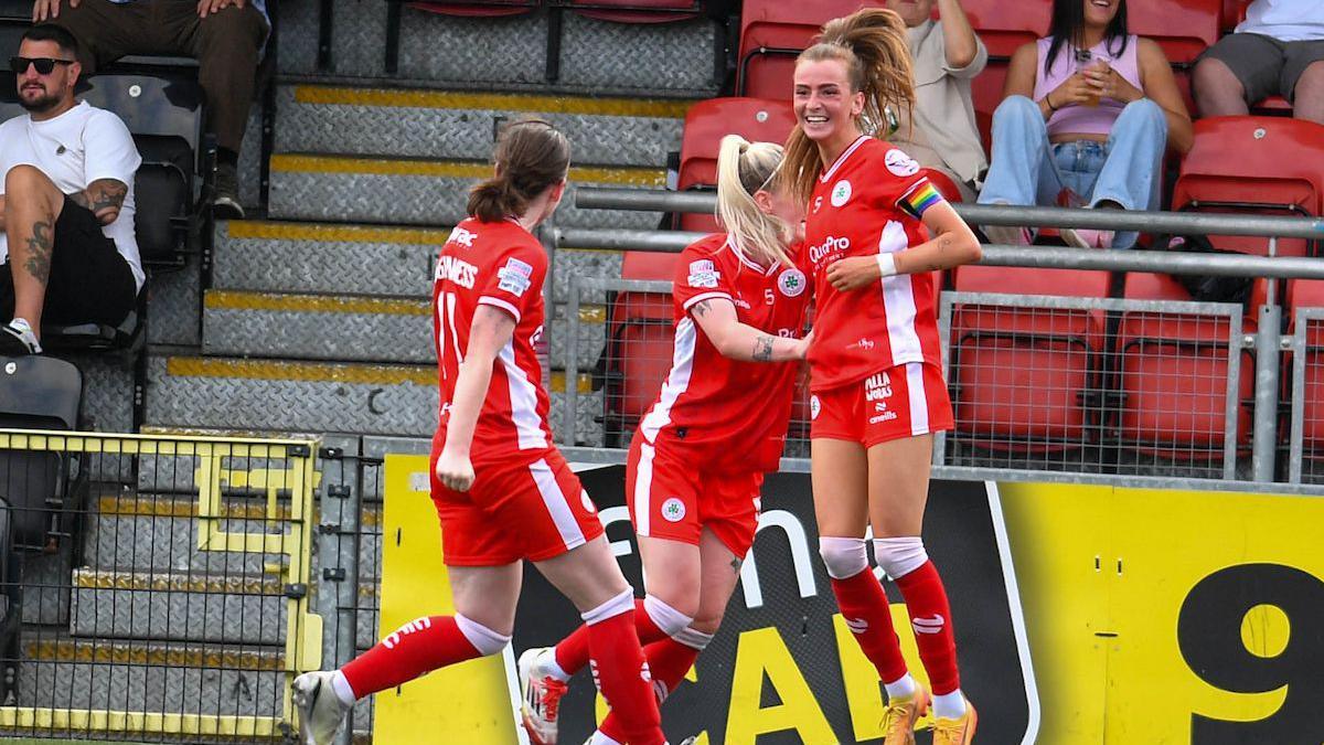 Caitlin McGuinness celebrates