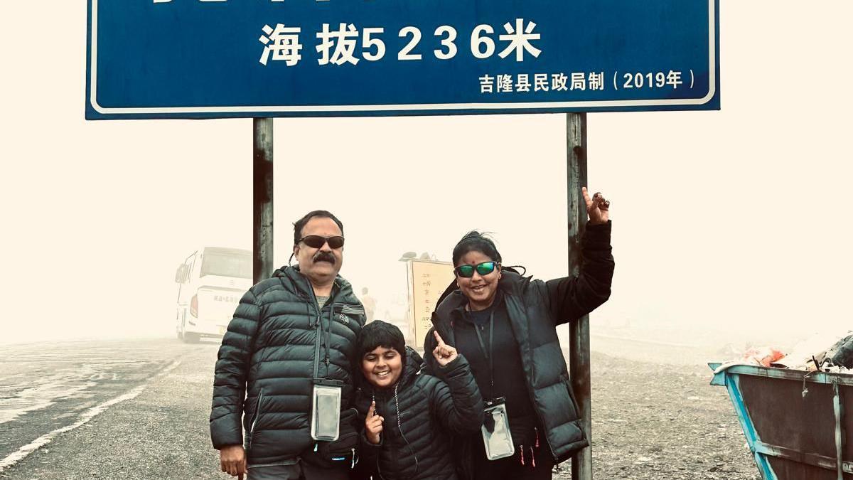 Dr Thottungal with her husband and son after completing the trek