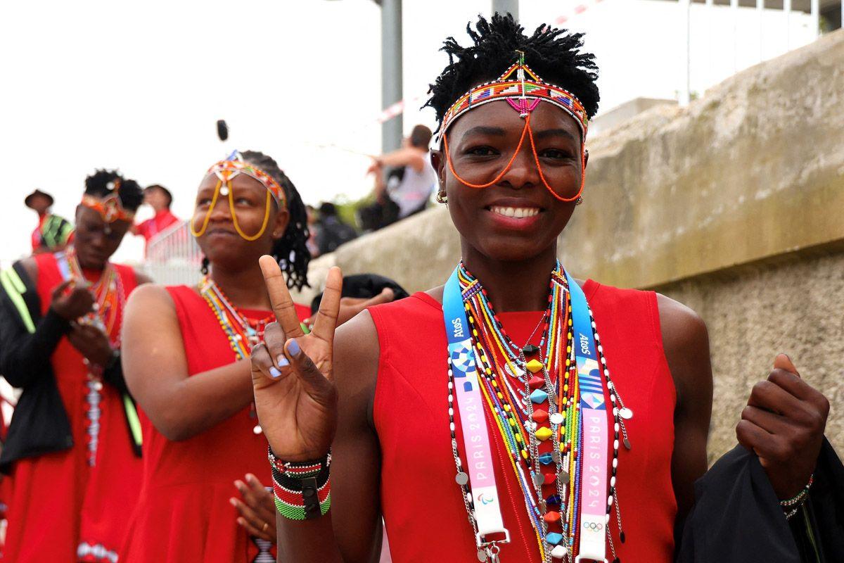 Athletes from Team Kenya pose for a photo prior to the Olympic opening ceremony