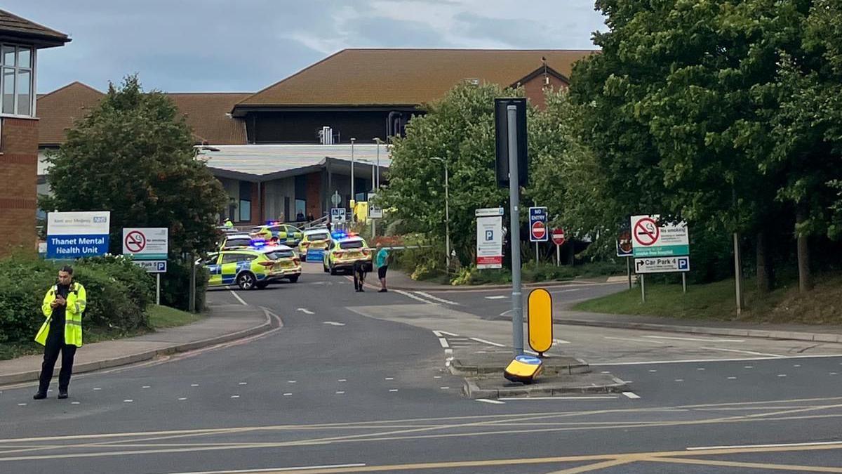A number of police cars outside QEQM hospital in Margate  