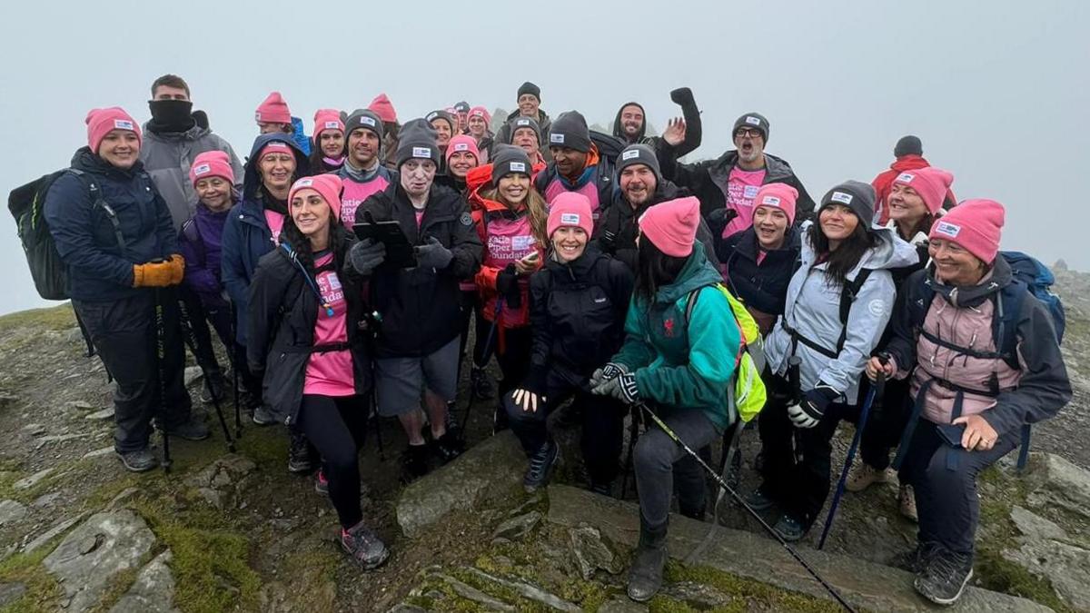 Katie Piper on Snowdon with a group of fellow hikers