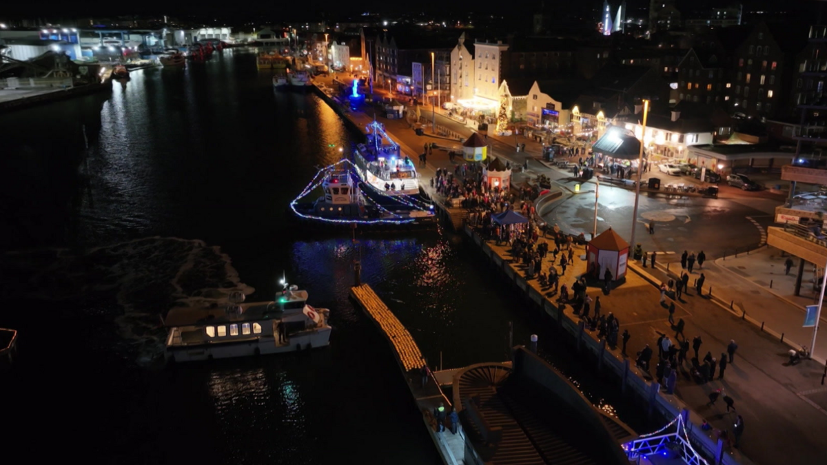 Drone footage of Poole Quay with the candle light lanterns.