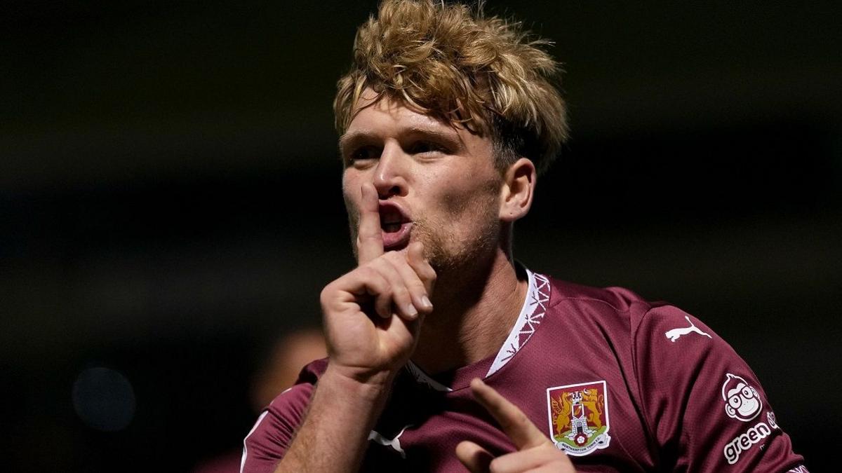 Cameron McGeehan celebrates his and Northampton's second goal against Peterborough