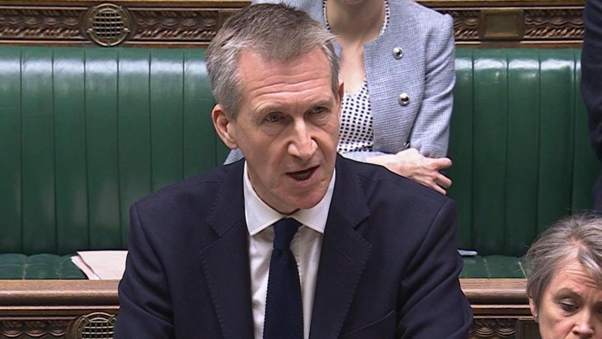 Dan Jarvis, who has short grey hair and wears a navy blue suit, speaks to the House of Commons 