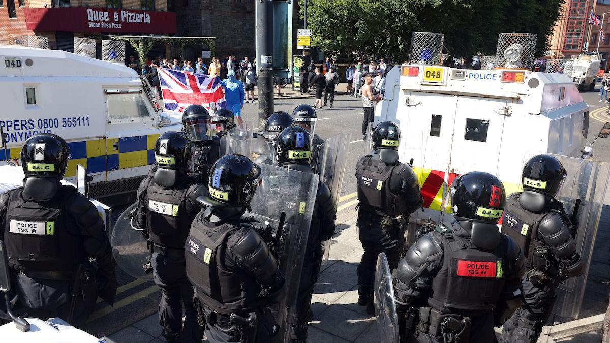 Police in riot gear protected the Belfast Islamic Centre on University Road