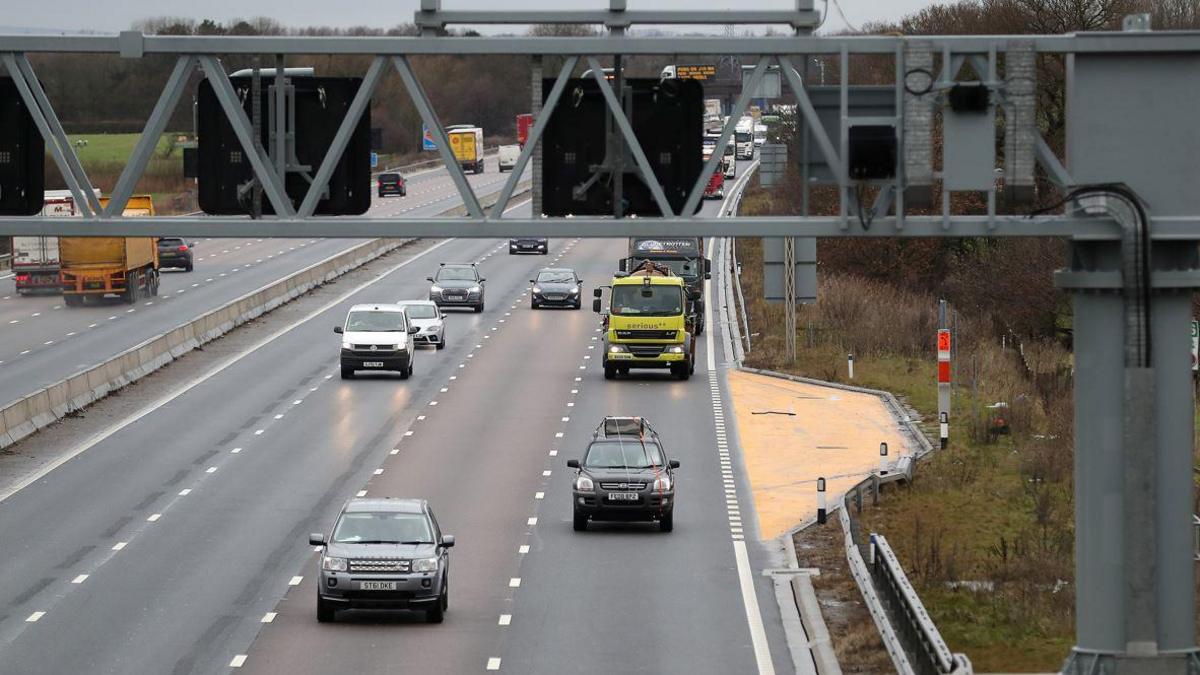 Cars travelling towards the camera on the M6 motorway