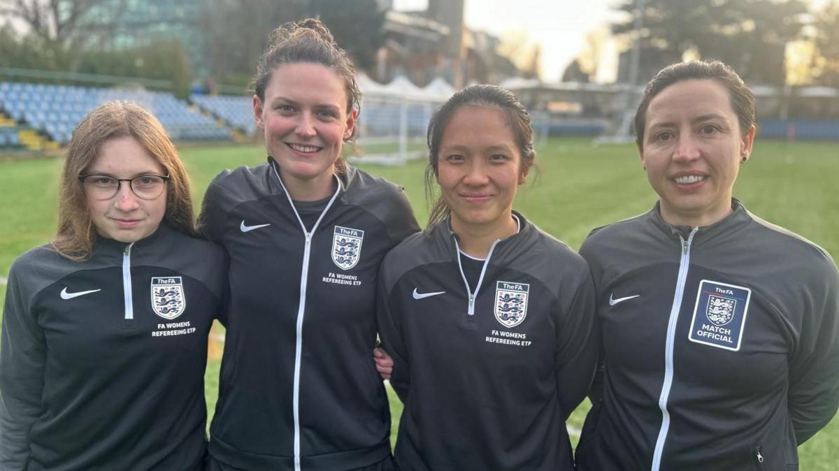 The four female referees from the FA that travelled to officiate