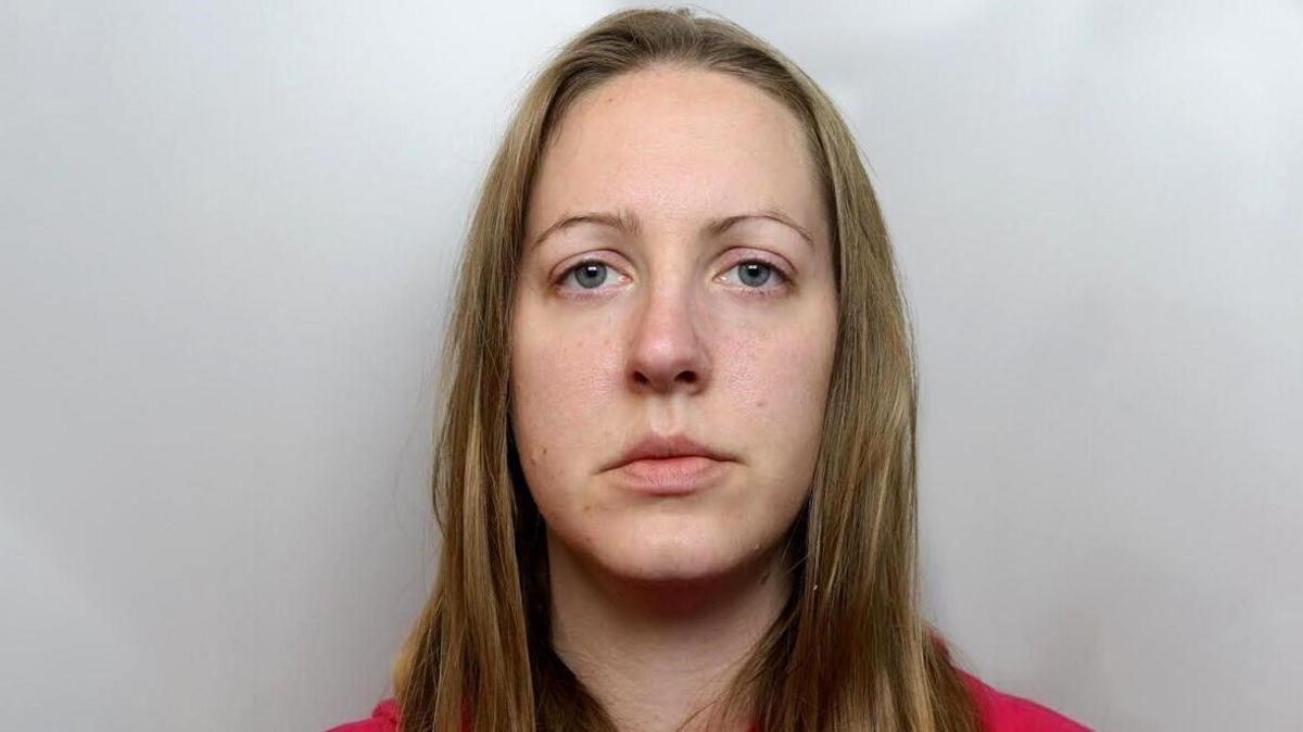 Police handout image of convicted serial killer Lucy Letby, with blonde hair worn loose and a red top on looking straight-on at the camera with a neutral expression