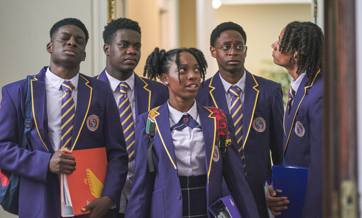 L-R Aruna Jalloh, Josh Tedeku, Jodie Campbell, Myles Kamwendo, Sekou Diaby in BBC Three drama series Boarders. They are in school uniform and all look apprehensive.
