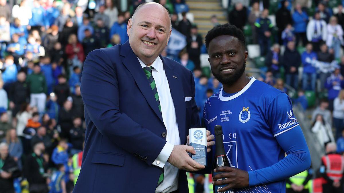 Gael Bigirimana with the man-of-the-match trophy