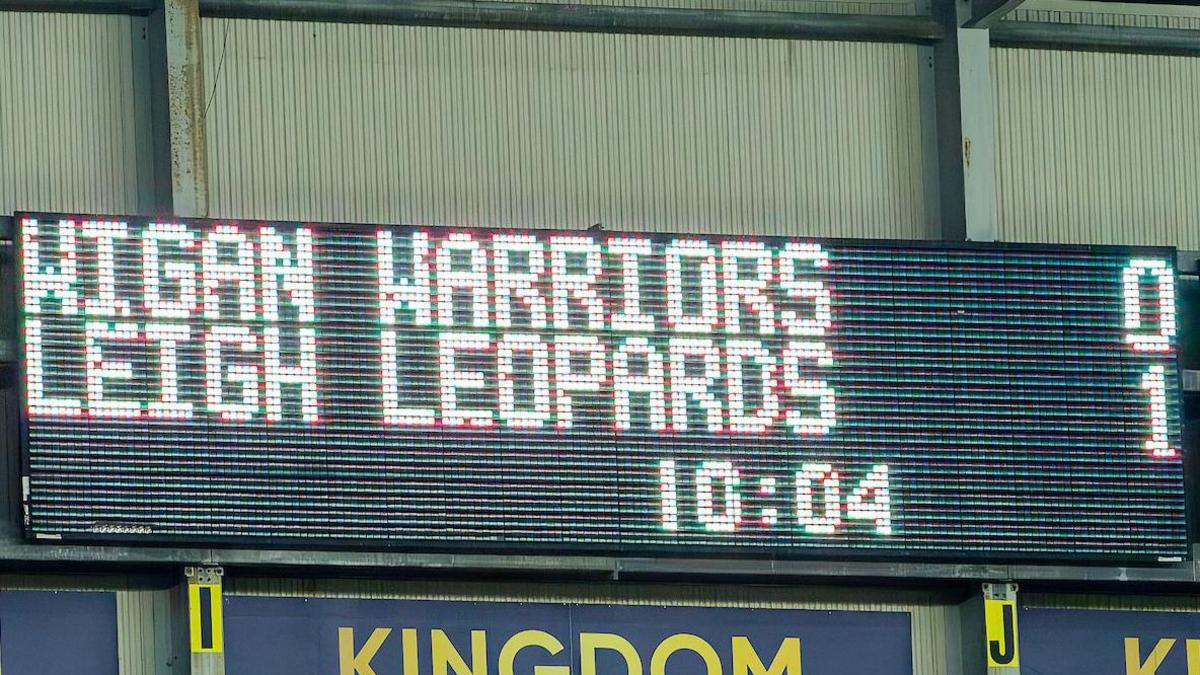 A scoreboard showing Wigan Warriors 0-1 Leigh Leopards