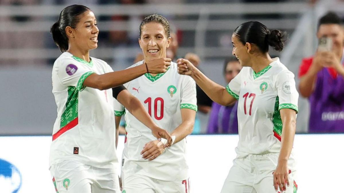 Ghizlane Chebbak (left) celebrates with her Morocco team-mates