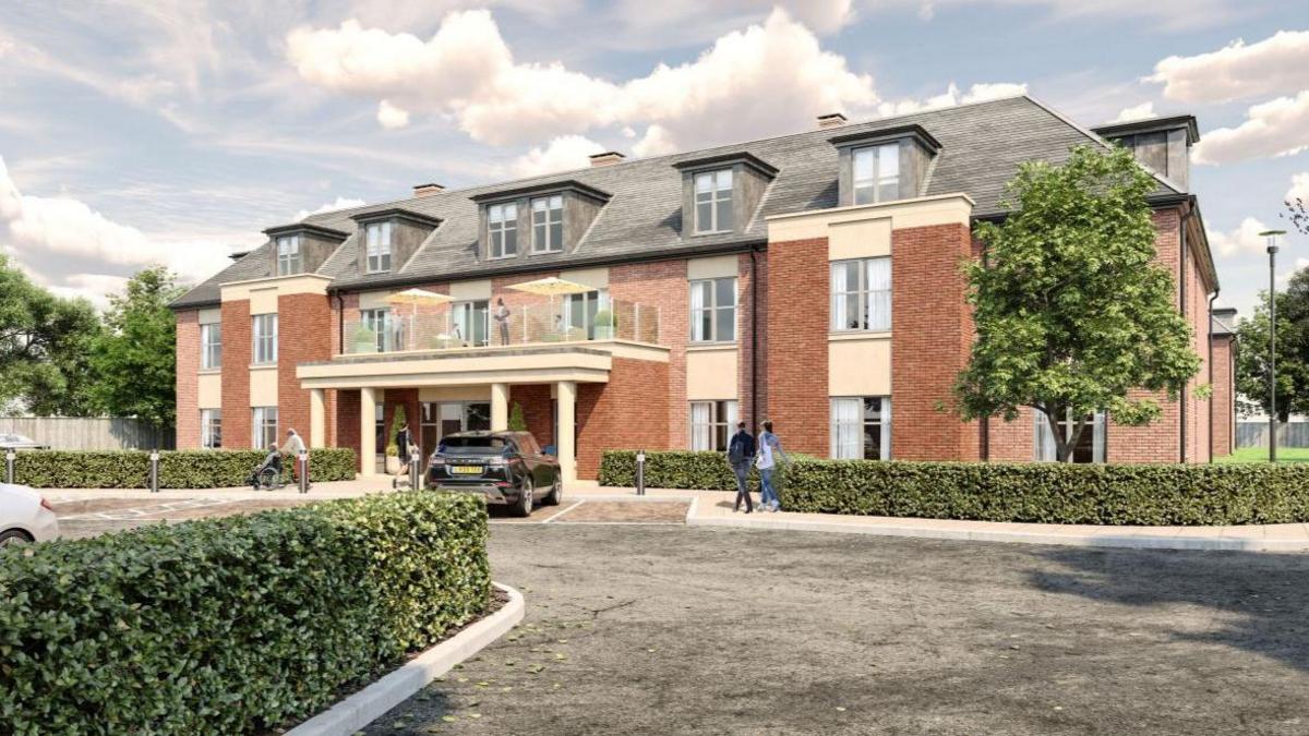 Computer simulation of a two-and-a-half storey brick-built care home with a pillared entrance area and balconies above. There is a low hedge around the building and some trees.  There is a sweeping driveway / car park, with one black car parked.