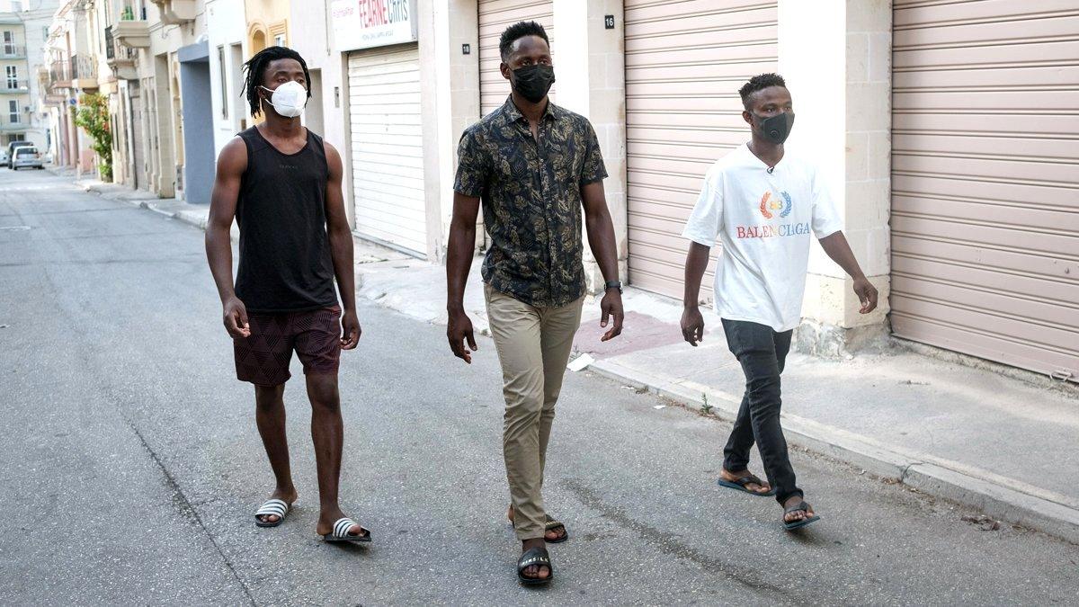 Abdalla, Abdul and Lamin in a street in Malta