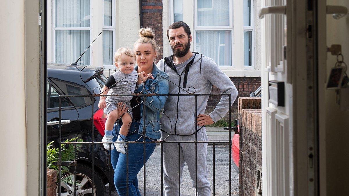 Joanne Goffey and Marshall Kinder-Maiss with their child