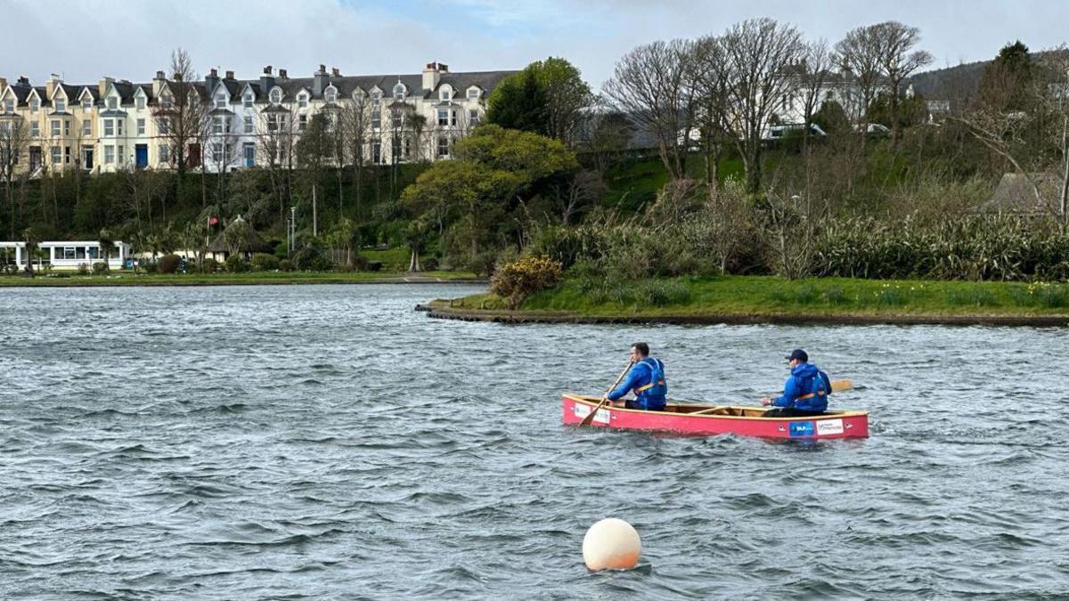 Martin Malone and a fellow Expedition Limitless team member in the canoe on the Mooragh Park boating lake